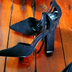 Black pointed ankle strap heels